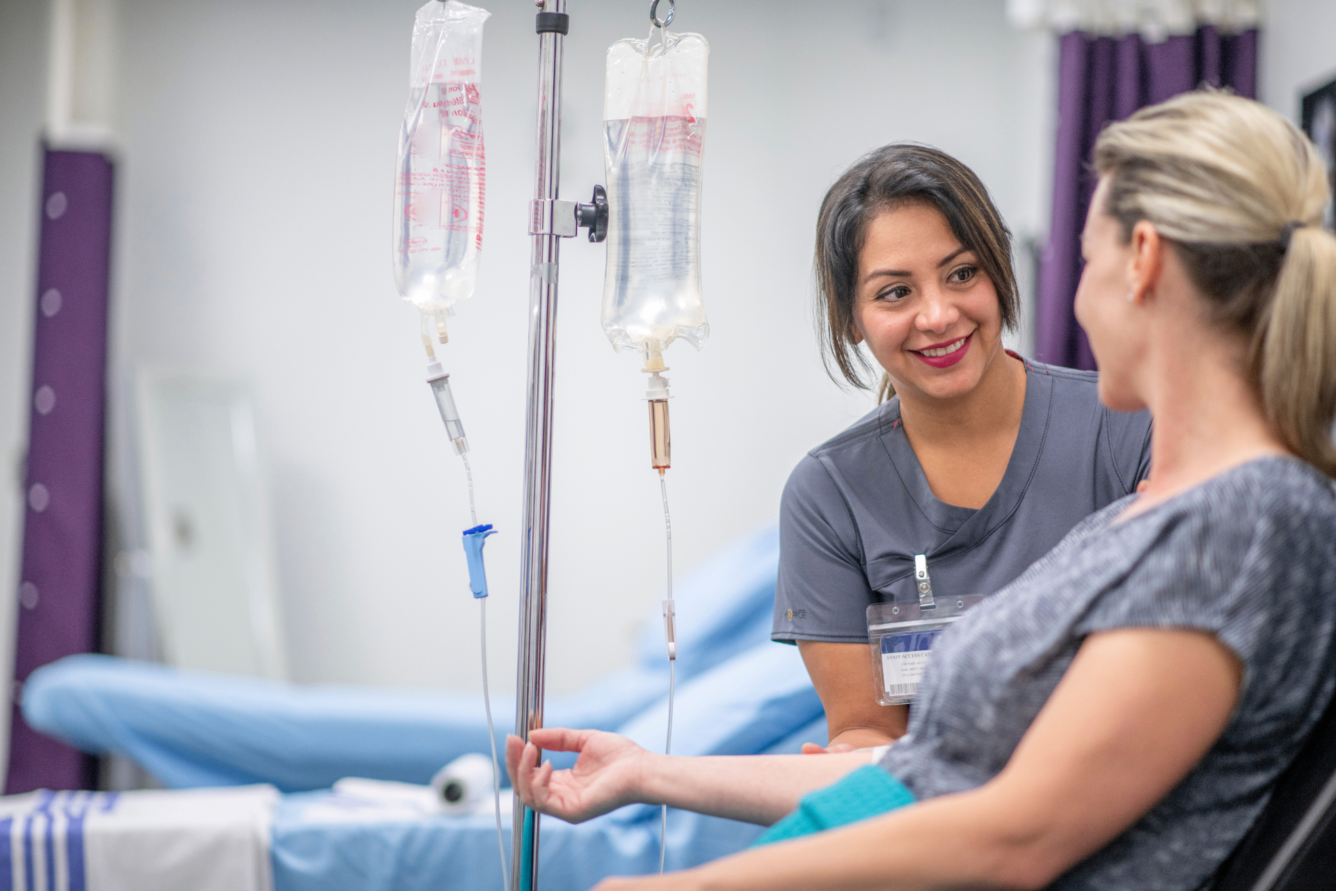 Registered Nurse with a guest during a stem cell IV infusion at iCRYO Grosse Pointe
